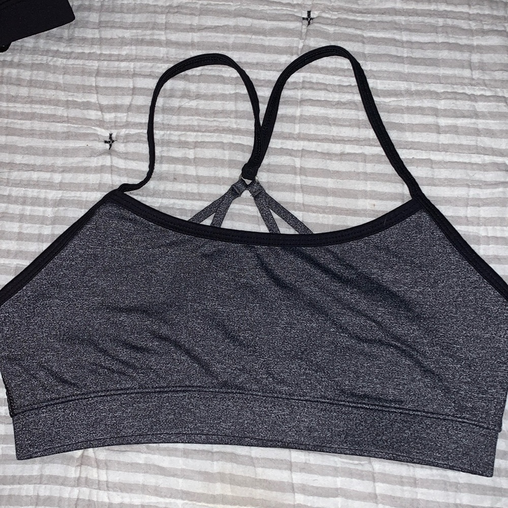 Black sports bra no tags but fits like a SIZE XS